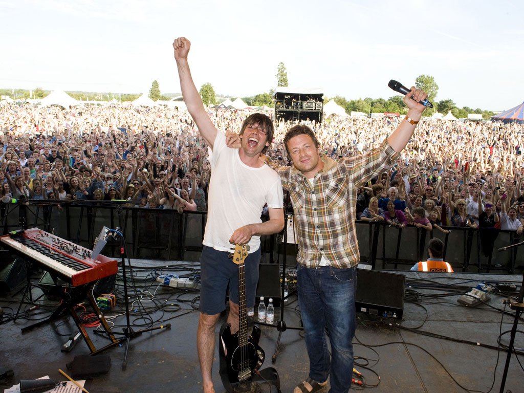 Jamie Oliver and Alex James on stage at Big Feastival 2012